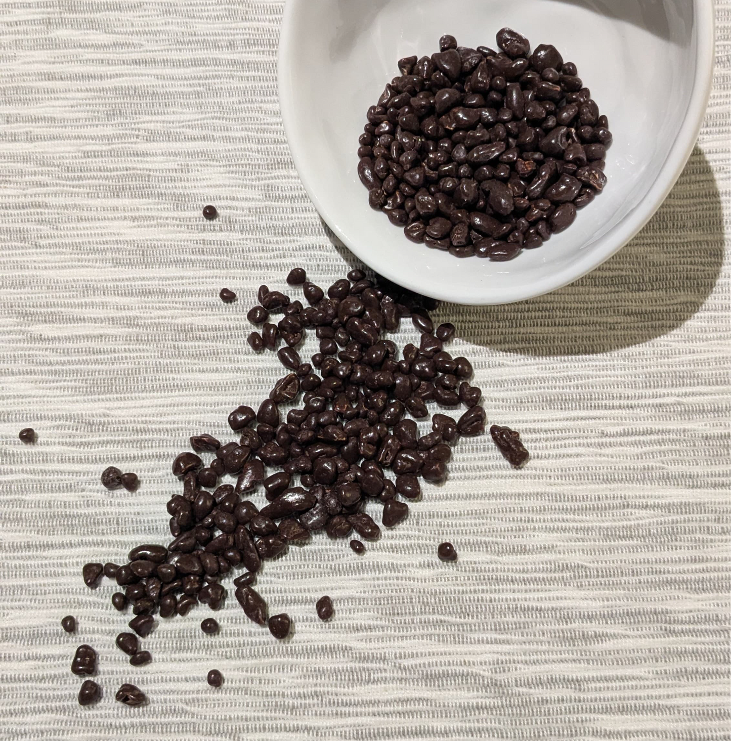 Nibs bañados en chocolate (150g)